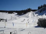 Practice slope with moving carpet at the June Meadows Chalet