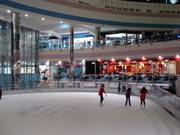 The ice skating rink across from the entrance to the ski hall
