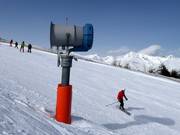 Snow-making equipment beside the slope