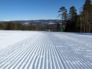 Perfect slope preparation in the ski resort of Stöten