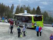 Ski buses at the base station in Siusi allo Sciliar (Seis am Schlern)