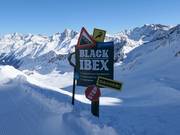 Warning before the extremely steep Black Ibex slope