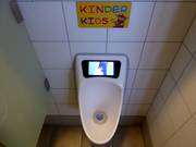 Children's toilet with display