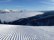 Perfectly groomed slopes throughout the 4-Mountain Ski Area