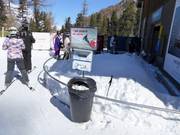 There are garbage cans and free tissues provided in the ski resort