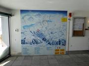 Piste map at the mountain station of the gondola lift
