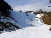 Black slope at the quad chairlift