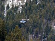 Helicopters go up to the mountains from Panorama 