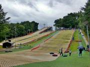 View of the entire dry skiing area with the tubing slope
