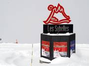 Stele on the seam of the ski resorts which form Les Sybelles