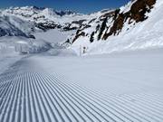 Perfectly groomed slope in the ski resort of Titlis