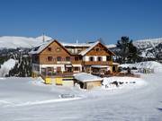Almstube with rooms in the ski resort