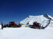 Grooming machines ready to work on the snowpark