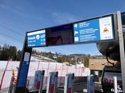 Digital displays at the entrance to the gondola lift