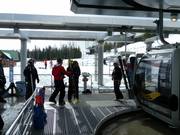 The staff always assists with boarding the gondola lift.
