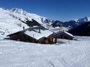 Self-catering huts in the middle of the ski area