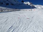 Beginner area in Les Agudes Village with conveyor belt