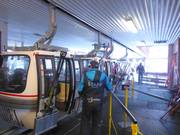 Assistance is provided when boarding the gondola lift.