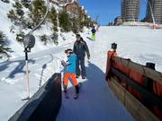 Assistance when getting on the platter lift