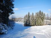 It can happen that the lower slope cannot be groomed due to a lack of snow.