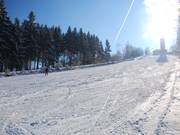 The upper slope in its full length