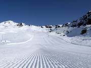 Perfectly groomed slope in the Madrisa ski area