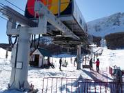 Staff is present at the chairlift.