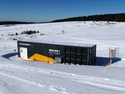 Snowmaking at above-freezing temperatures