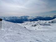 Fresh snow on the black run Le Tunnel at Pic Blanc