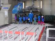 8-person Schwanden chairlift with child safety restraints