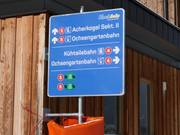 Slope signage including opening status