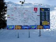 Detailed information board with slope map and operating status in the ski area