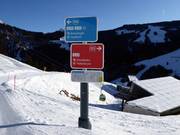 Signposting with color-coded difficulty levels (blue = easy, red = intermediate, black = difficult)