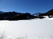 View over the Spitzingsee lake to the ski resort