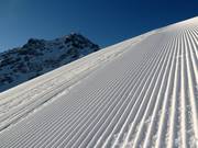 Freshly groomed slope with Kitzbüheler Horn