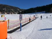 Magic carpet in the learning area – next to it the button lift