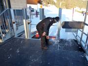 The boarding area of the gondola lift is swept several times a day
