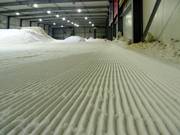 Groomed slope in the Snow Valley indoor ski hall