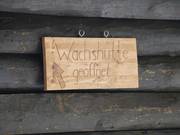 The waxing hut is located at the mountain station of the ski lifts.