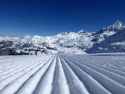 Perfect slope grooming in the ski resort of Weissee Gletscherwelt