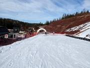 Practice slope with conveyor belt