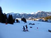 View from the ski slope towards Reuttener Hahnenkamm