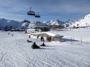 Beginner slope and covered conveyor belt Viderböden on the Idalp