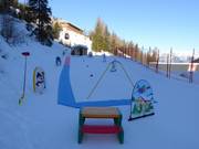 Tip for children  - Children's area run by the Olympic ski school.