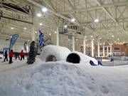 Playground with slide in the indoor ski hall