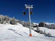 Dorfbahn Gerlos I - 10pers. Gondola lift with seat heating (monocable circulating ropeway)