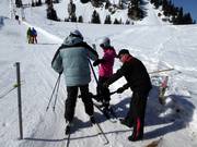 At most drag lifts and button lifts, the bars are handed to you.