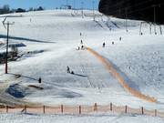 Small toboggan slope next to the easy slopes