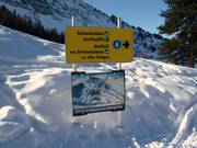 Sign-posting in the ski resort with a trail map