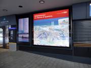 Large information board at the valley station of the zellamseeXpress